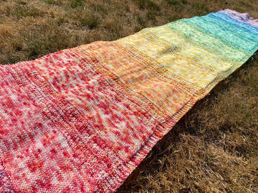 Pride Goeth Before the Shawl by Amy Snell; knit with 12 mini-skeins in rainbow colors